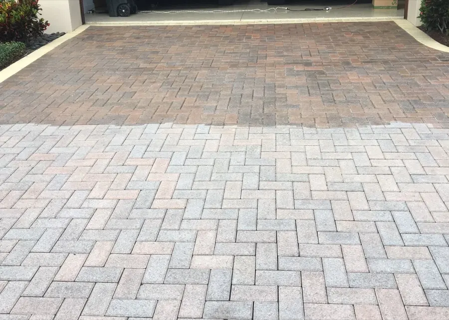 Paver driveway with a visible color contrast between two sections